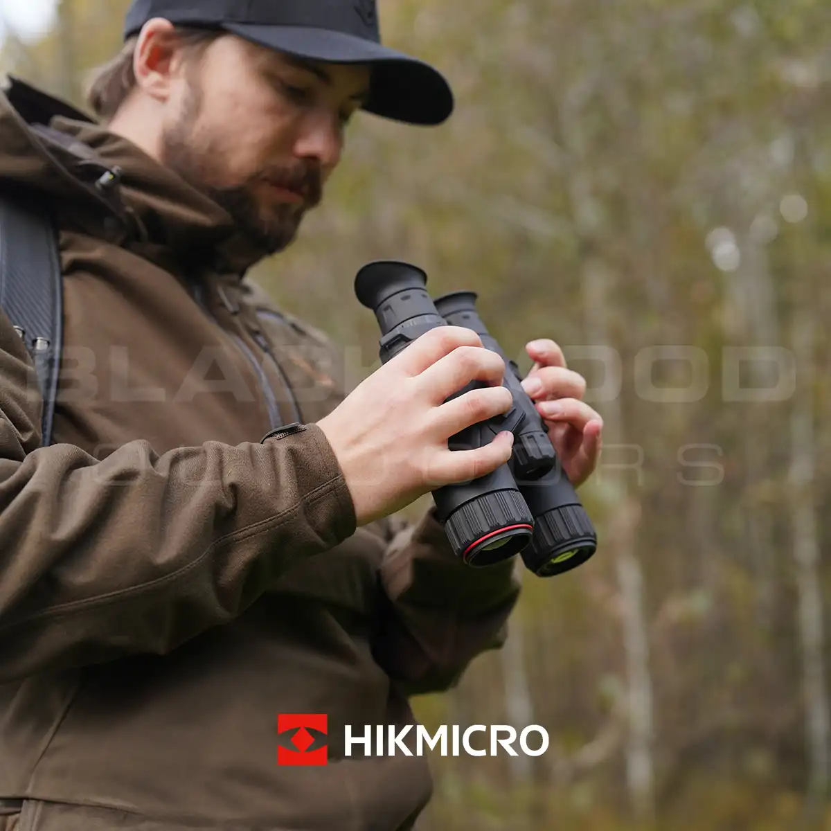 HikMicro Habrok Thermal Binoculars fitted into hands HQ35L model