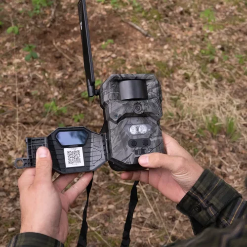 HikMicro T16 Trail Camera - In use in hand adjusting settings.